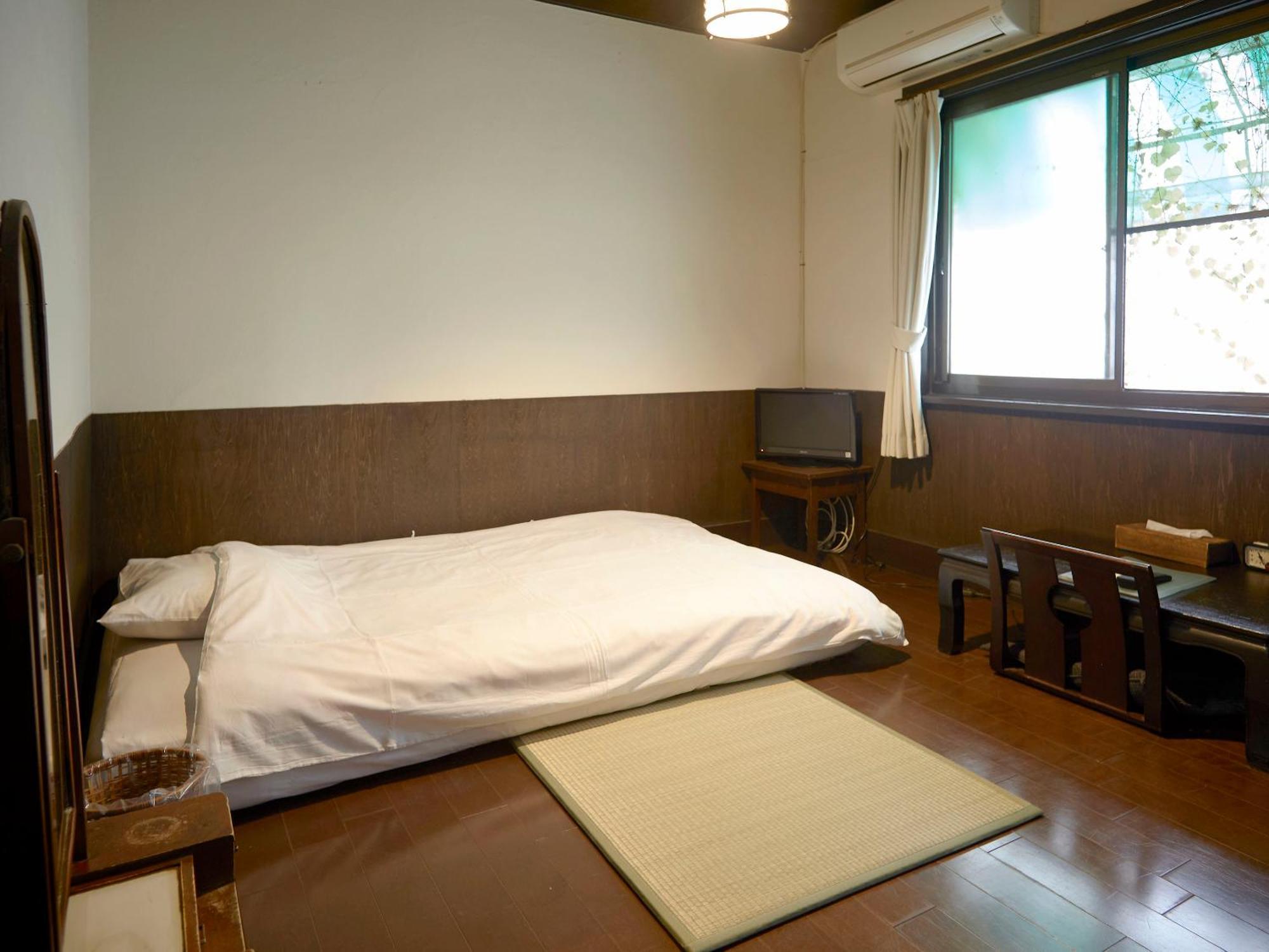 Takeyaso Ryokan Амагасакі Номер фото
